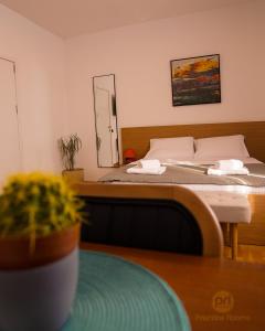 Postel nebo postele na pokoji v ubytování Pri Rooms