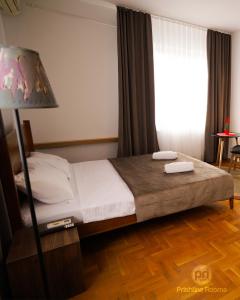 Postel nebo postele na pokoji v ubytování Pri Rooms