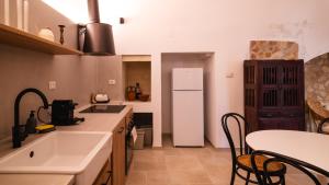 O bucătărie sau chicinetă la Casa Mela by Rentbeat