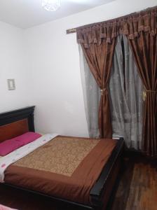 Giường trong phòng chung tại DEPARTAMENTO SIETE