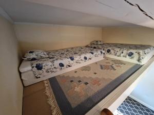 Postel nebo postele na pokoji v ubytování Madickenhuset