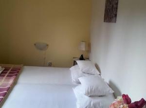 Ένα ή περισσότερα κρεβάτια σε δωμάτιο στο Apartments Štrbić +14 φωτογραφίες