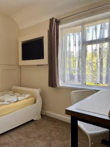 Postel nebo postele na pokoji v ubytování Home accommodation
