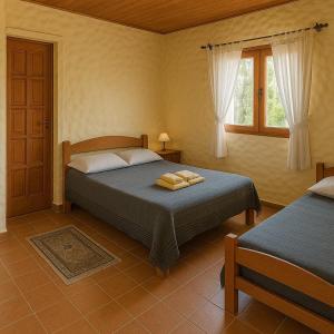 En eller flere senge i et værelse på Cabañas Achalay – Refugio en Santa María