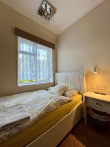 Postel nebo postele na pokoji v ubytování Home accommodation