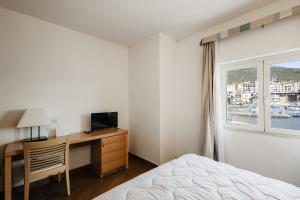 Katil atau katil-katil dalam bilik di Bi Hotel