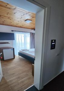 Voodi või voodid majutusasutuse Hotel LBC toas