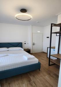 Voodi või voodid majutusasutuse Hotel LBC toas
