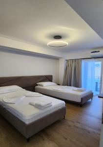 Voodi või voodid majutusasutuse Hotel LBC toas