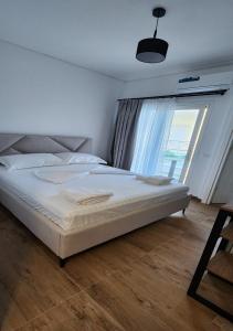 Voodi või voodid majutusasutuse Hotel LBC toas