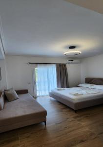 Voodi või voodid majutusasutuse Hotel LBC toas