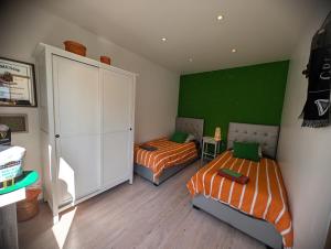 Letto o letti in una camera di Chemin des Vignerons