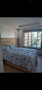 Una cama o camas en una habitación de Residence Garden Paradise plage luxe