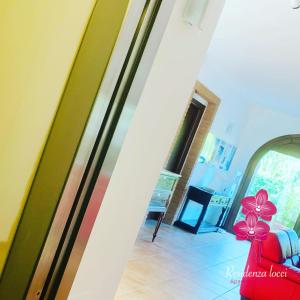 Posezení v ubytování Residenza Locci - Rooms & Apartments
