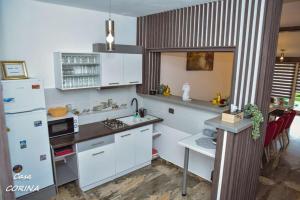 Kuchyň nebo kuchyňský kout v ubytování Casa Corina