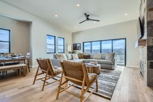 a living room with a couch and a table at Deer Valley Mountain Luxury at Jordanelle 893 by SkyRun Park City in Heber City