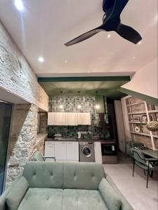 Kuchyň nebo kuchyňský kout v ubytování Mavrommati Luxury Residence no1