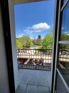 a view from the window of a building at Balkan Aparts in Hisarya