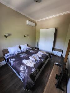 Postel nebo postele na pokoji v ubytování Balkan Aparts + 56 fotografií