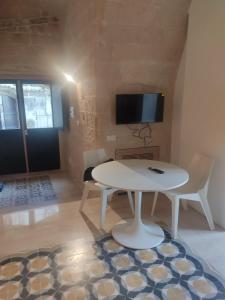 Μια τηλεόραση ή/και κέντρο ψυχαγωγίας στο Apartments for you Sassi +7 φωτογραφίες