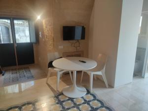 Μια τηλεόραση ή/και κέντρο ψυχαγωγίας στο Apartments for you Sassi