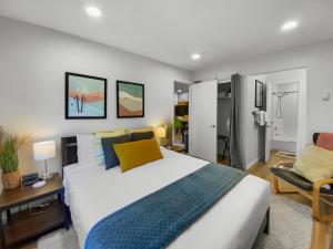 a bedroom with a large bed and a desk at Park City Gem at Red Pine! Cozy Ski Condo with Heated Pools and Hot Tubs! B4 by SkyRun Park City in Park City
