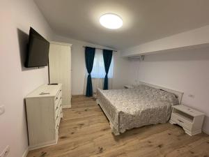 Postel nebo postele na pokoji v ubytování Casa George