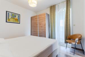 Postel nebo postele na pokoji v ubytování Villa Marin - 4 apartments