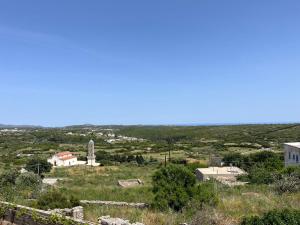 a view of a city from a hill at Drymonas cottage in Kythira