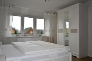 Postel nebo postele na pokoji v ubytování Haus Prause Wohnung 3