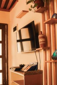 TV a/nebo společenská místnost v ubytování Tecoma guesthouse