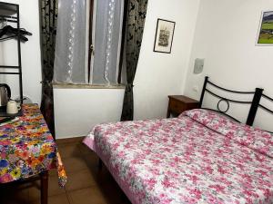 Łóżko lub łóżka w pokoju w obiekcie Villa Tuscany Siena