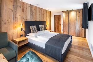 Postel nebo postele na pokoji v ubytování Chalet Ortles Apt ll