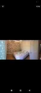 Ένα ή περισσότερα κρεβάτια σε δωμάτιο στο Maison de charme 8 personnes