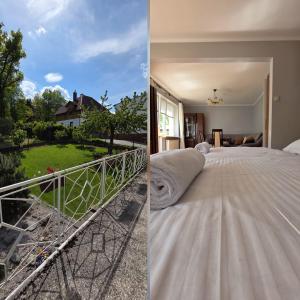 a bedroom with a bed and a balcony with a view at Willa Ada & Apartments in Karpacz
