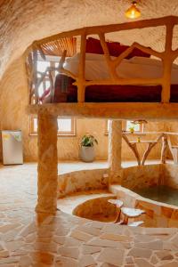 a room with two bunk beds in a building at Hotel Pachamama Campestre in Dosquebradas +163 photos