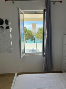 Postel nebo postele na pokoji v ubytování Spile Rooms Lukas