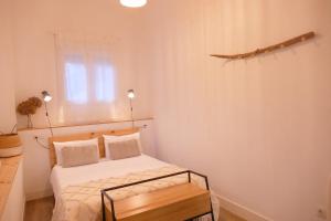 Postel nebo postele na pokoji v ubytování San Mar Apartamento