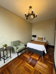 Letto o letti in una camera di Hotel Nutibara