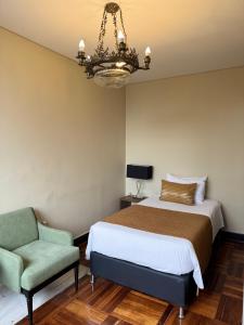 Letto o letti in una camera di Hotel Nutibara