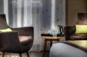 Posezení v ubytování Best Western Plus Nice Cosy Hotel