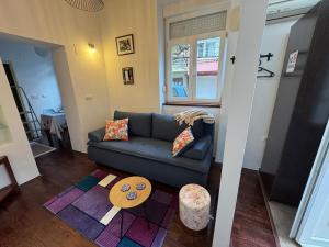 a living room with a couch and a table at Studio Sparky in Mostar