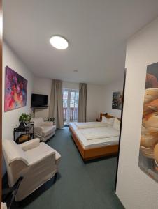 Postel nebo postele na pokoji v ubytování Parkhotel Bad Brambach