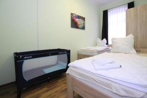 Postel nebo postele na pokoji v ubytování Ferienwohnung Askanier, Ballenstedt