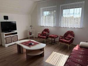A television and/or entertainment centre at Apartment in Balatonbereny/Balaton 18047