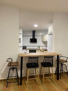 Η κουζίνα ή μικρή κουζίνα στο Apartamento Happy 2