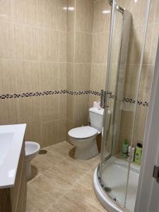 Ένα μπάνιο στο Apartamento Happy 2