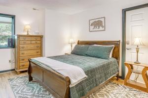 a bedroom with a bed and a dresser and a window at 4 Mi to Massanutten Resort Family Home with Views! in McGaheysville