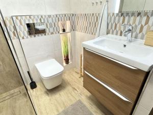 Kúpeľňa v ubytovaní Przystanek Rabka - Domek całoroczny + 23 fotografií