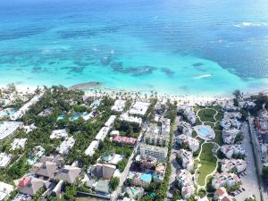an aerial view of a beach and the ocean at Villas Princesa Beach Apartments in Punta Cana +56 photos